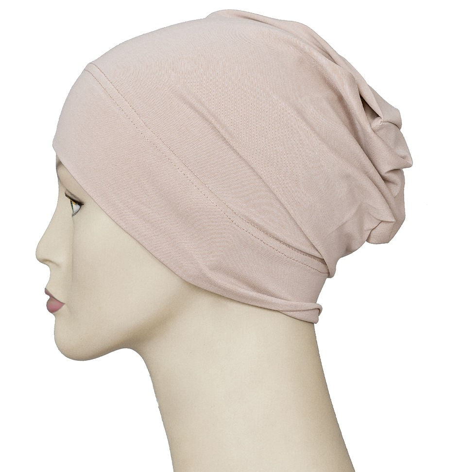 Cap in Palm Oyster